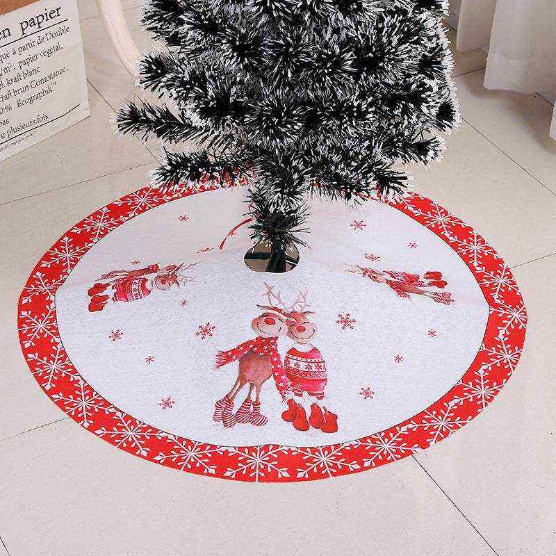 Christmas tree skirt with red border and reindeer Christmas scene decoration under tree