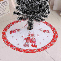 Christmas tree skirt with red border and reindeer Christmas scene decoration under tree