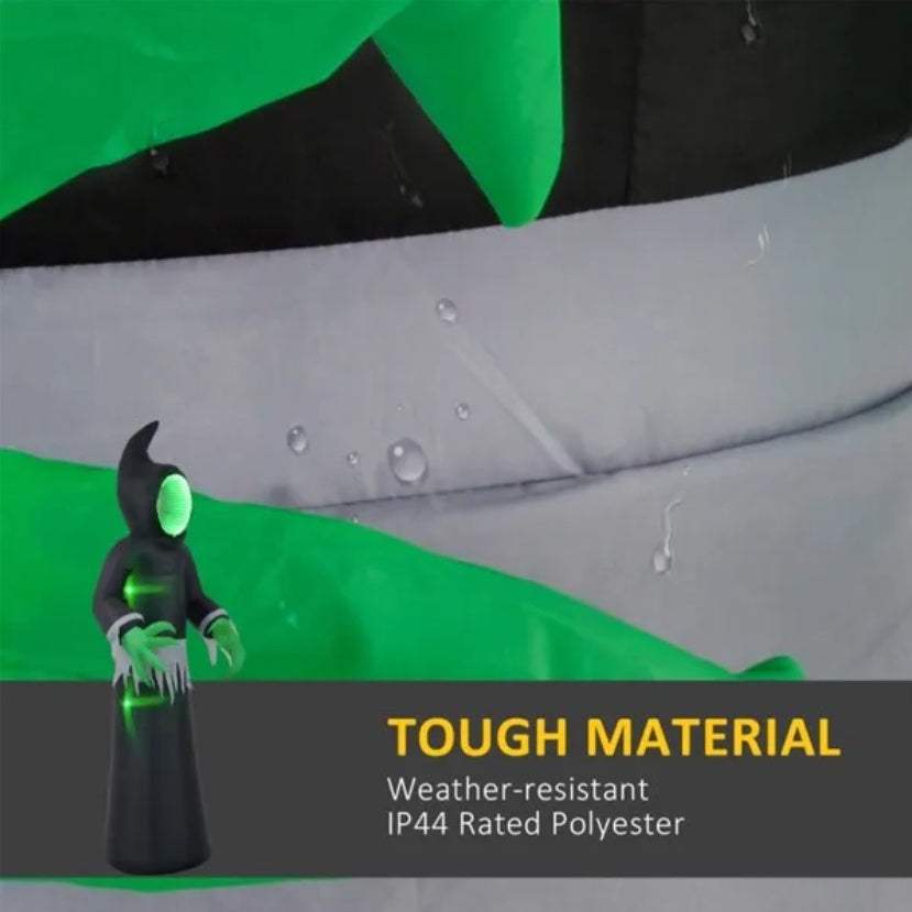 Halloween inflatable ghost with LED lights and eerie green face in a spooky graveyard setting with pumpkins and moonlight