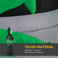 Halloween inflatable ghost with LED lights and eerie green face in a spooky graveyard setting with pumpkins and moonlight