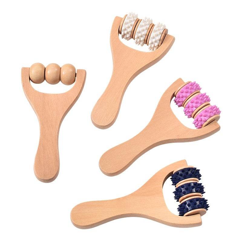 Woman using wooden portable roller foot meridian massage with three beads for stress relief and skin relaxation