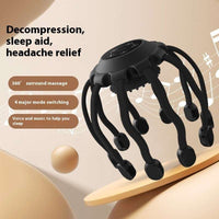 Black eight-claw USB head massager with 360-degree surround vibration and four modes for scalp relaxation and headache relief