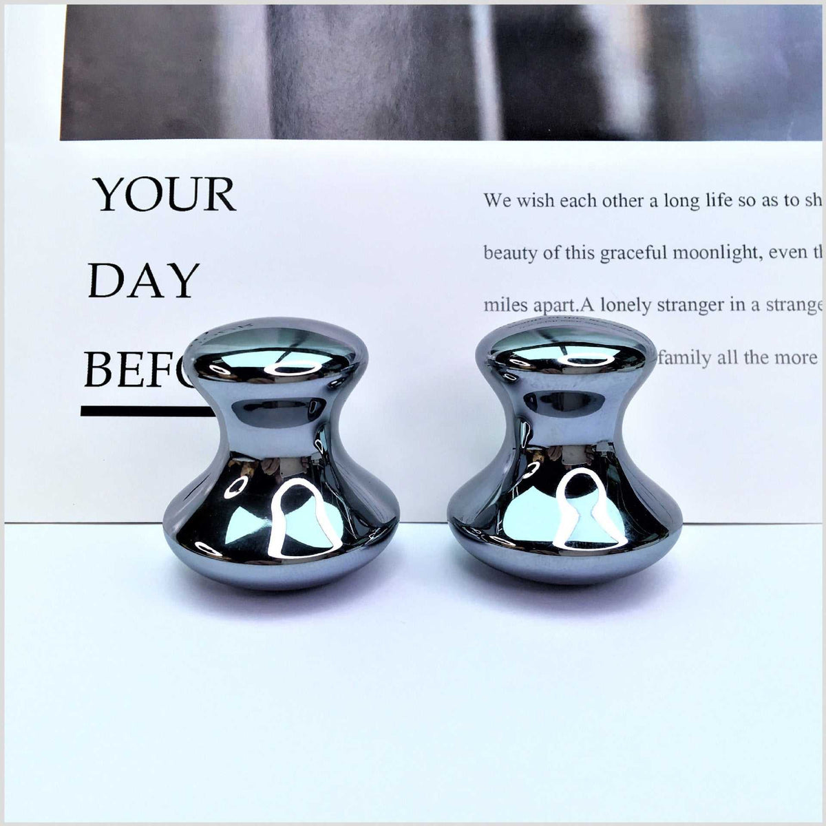 Quantum Stone Terahertz mushroom head massager pair with reflective metallic finish for massage therapy