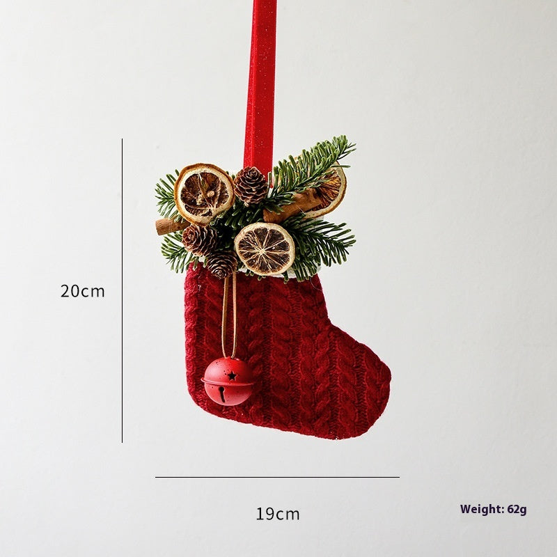 Festive knitted stockings Christmas Decoration hanging by fireplace