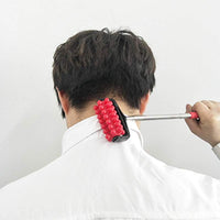 Man using telescopic plastic massage roller back scratcher with red rollers on neck