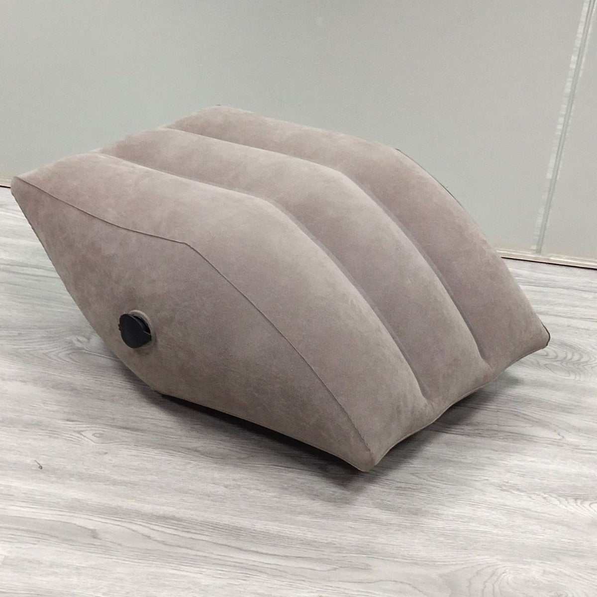 Home Artifact Inflatable gray PVC wedge leg pillow with flocking surface