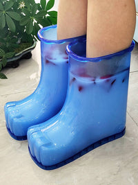 Blue plastic household massage foot basin boots for soaking feet with water and ice