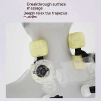 Woman using a rechargeable shoulder and neck trapezius massager in milky white color with remote control