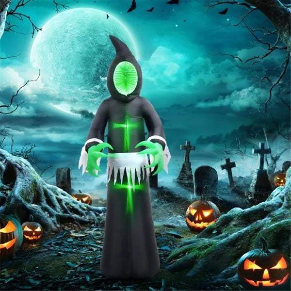 Halloween inflatable ghost with LED lights and eerie green face in a spooky graveyard setting with pumpkins and moonlight